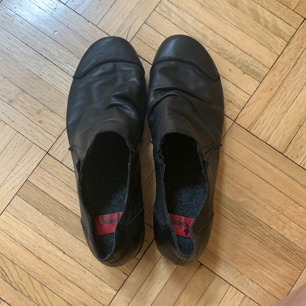 Small heeled black slip on shoes